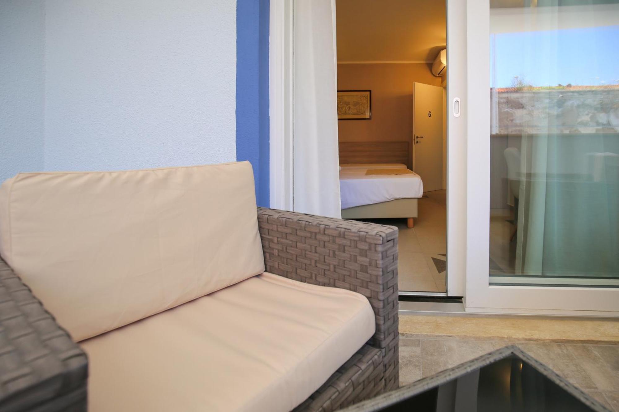 The Square Castelsardo Hotel Bagian luar foto