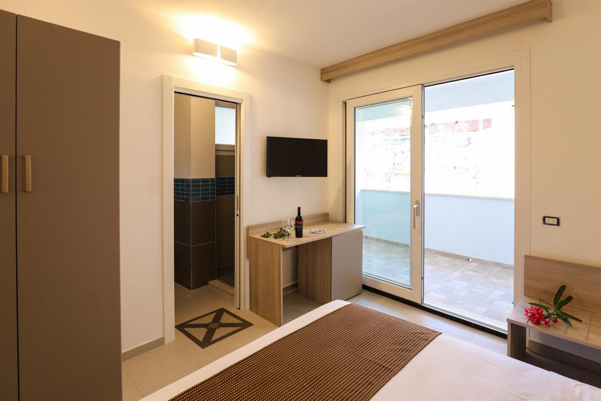 The Square Castelsardo Hotel Bagian luar foto